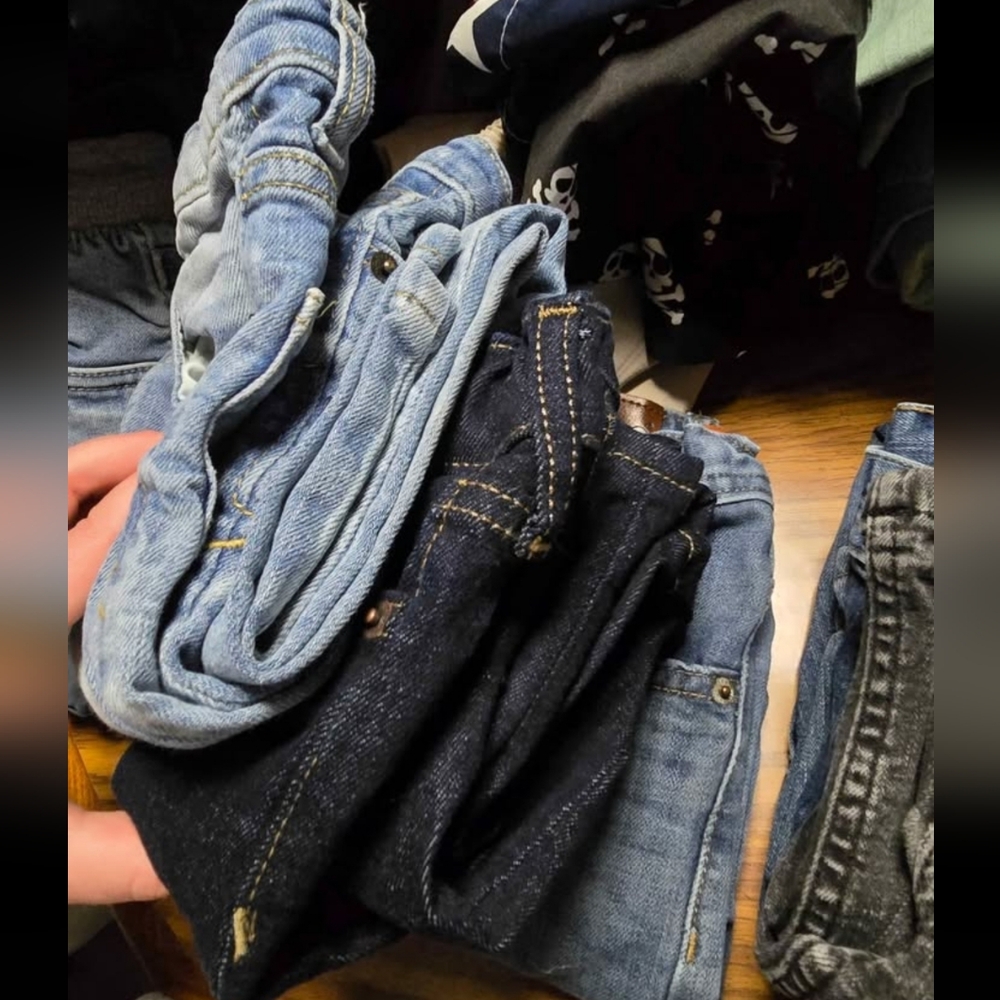 Stack of Blue Denim Jeans - Light & Dark Washes